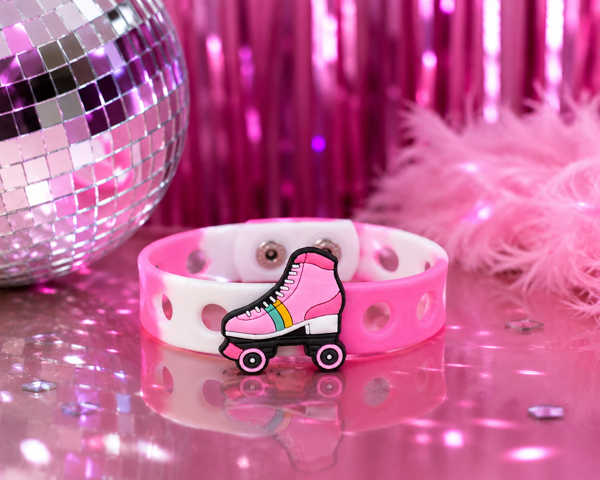 Fun roller skate charm bracelet with an adjustable band. Perfect for kids who love skating, colorful accessories, and playful everyday style.
