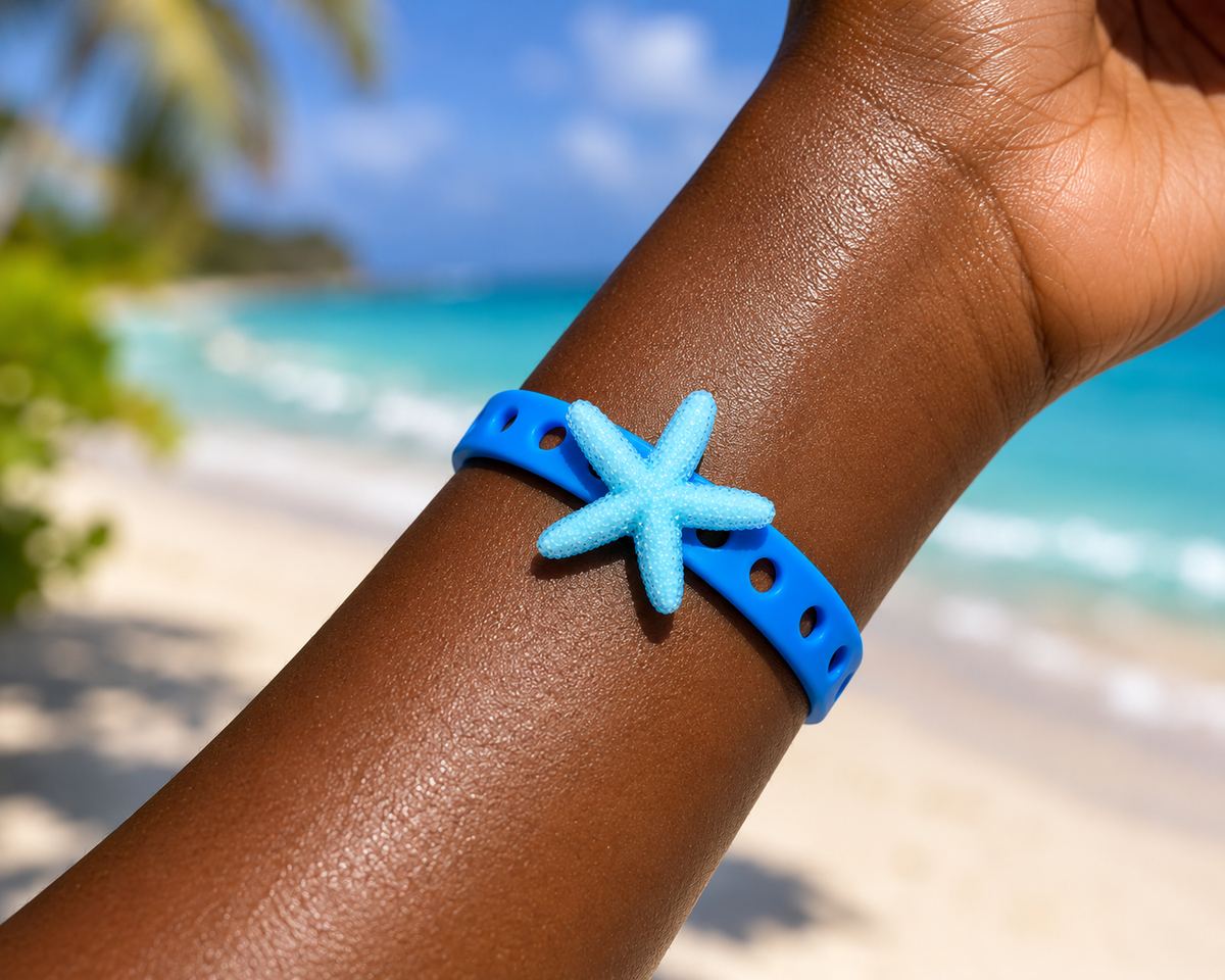 Ocean-inspired bracelet featuring a sparkling starfish centerpiece and vibrant blue silicone band. Perfect for beach lovers, vacations, and coastal style.