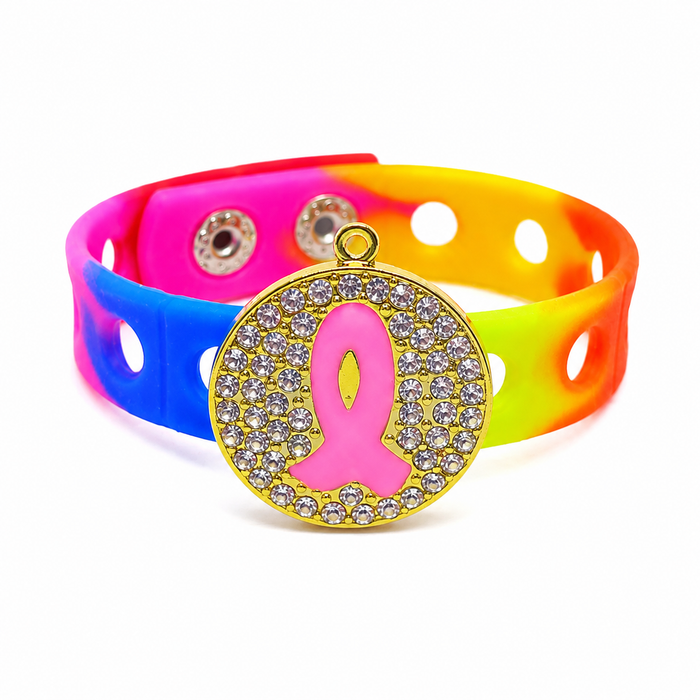 🎀 Vibrant breast cancer awareness bracelet featuring a sparkling pink ribbon charm on a colorful silicone band designed to inspire hope, strength, and support.