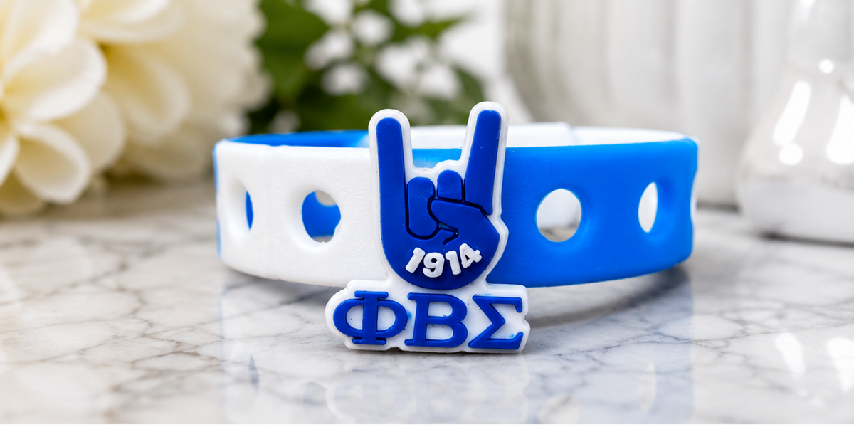 💙 Stylish blue-and-white ΦΒΣ-inspired silicone bracelet featuring a bold hand sign centerpiece. Perfect for Greek life gifts, probate season, and everyday brotherhood pride.