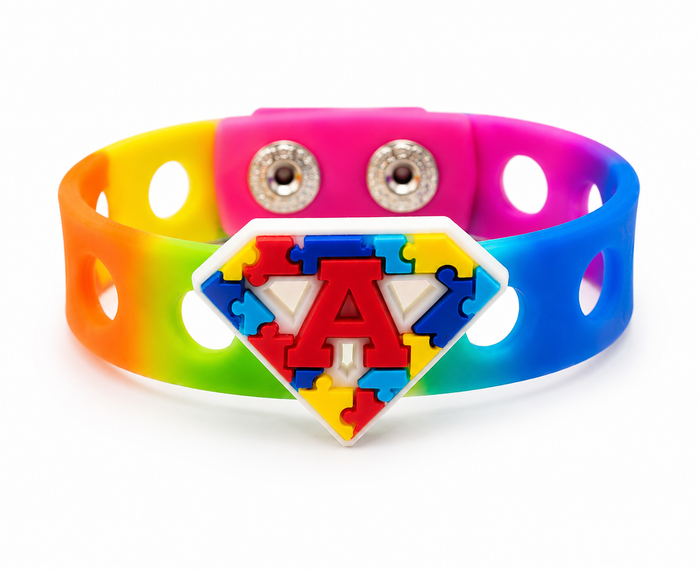 🌈 Bright autism awareness bracelet featuring a colorful puzzle superhero emblem and rainbow silicone band. Inspiring, fun, and perfect for everyday support and inclusion.