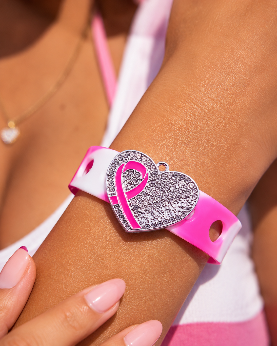 💖 Stylish awareness bracelet featuring a sparkling rhinestone heart charm and pink ribbon design on an adjustable silicone band. Inspiring, meaningful, and elegant.