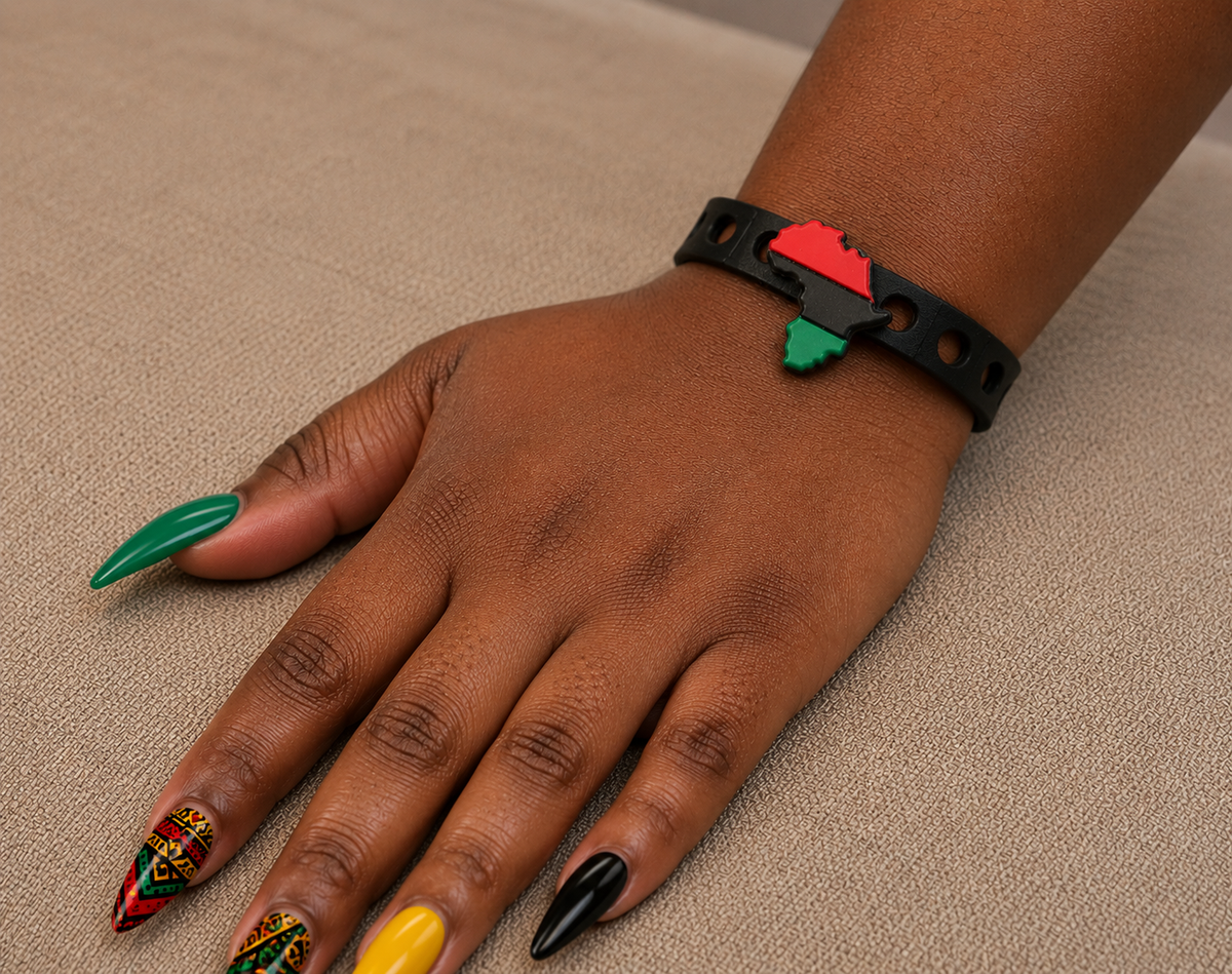 Show your heritage with the Mama Africa Bracelet. Features a bold Africa-shaped charm, Pan-African colors, adjustable fit, and everyday comfort.