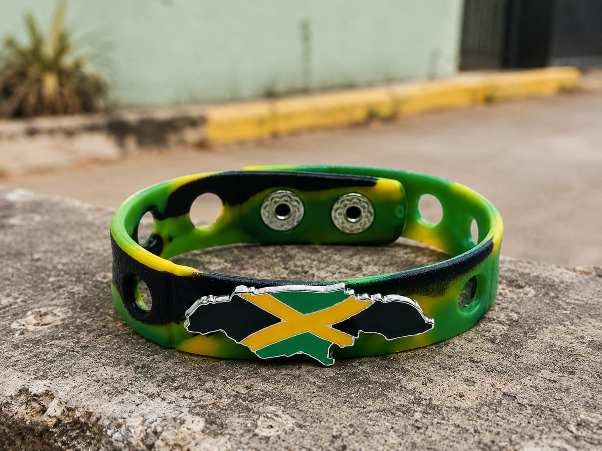 Celebrate Jamaican heritage with the One Love Legacy Bracelet. Featuring a Jamaica-shaped flag emblem and iconic island colors, this bracelet represents unity, culture, and pride.