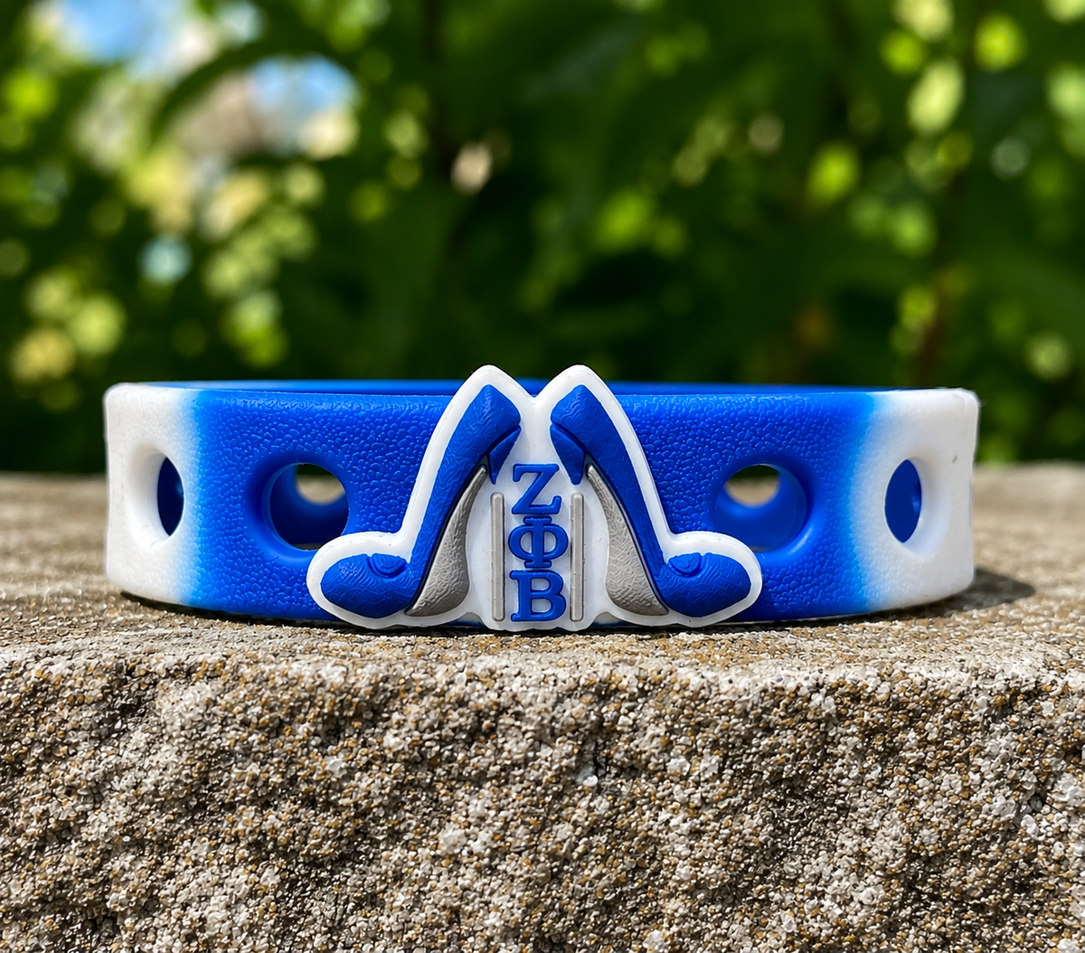 💙 Elegant blue-and-white sorority-inspired bracelet featuring a bold ΖΦΒ high heel centerpiece on a comfortable silicone band. Perfect for Greek life gifts and sisterhood pride.