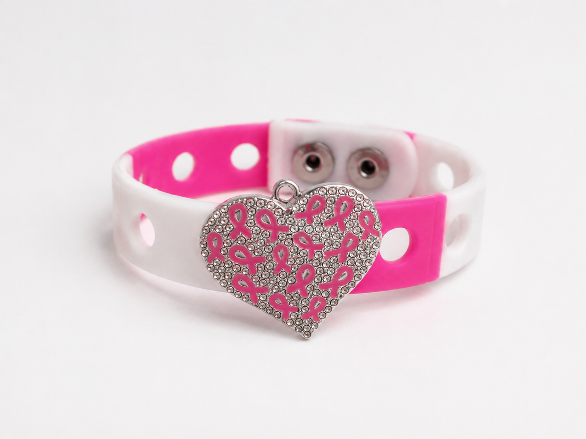 🎀 Elegant breast cancer awareness bracelet featuring a rhinestone heart charm and adjustable pink-and-white silicone band. Inspiring, stylish, and meaningful.