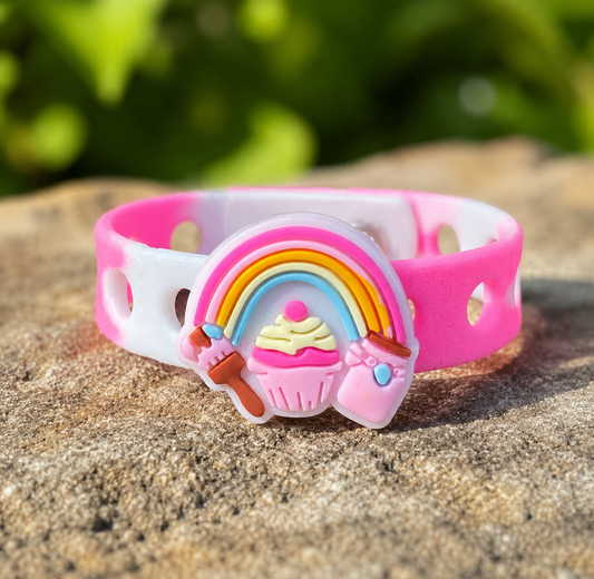 🍭 Sweet rainbow and cupcake charm bracelet with an adjustable band. Perfect for birthdays, gifts, party favors, and everyday fun.