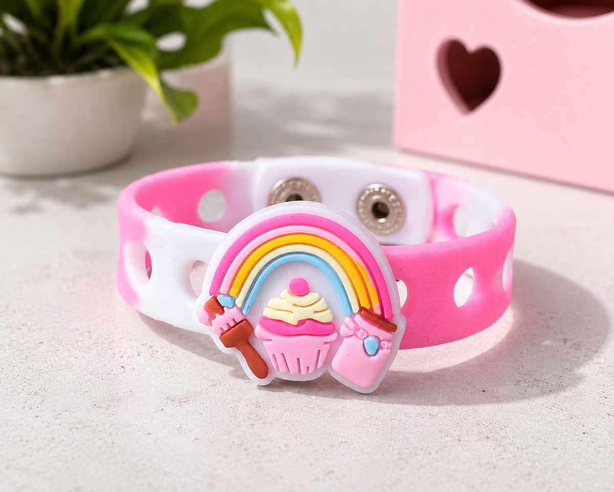 🍭 Sweet rainbow and cupcake charm bracelet with an adjustable band. Perfect for birthdays, gifts, party favors, and everyday fun.